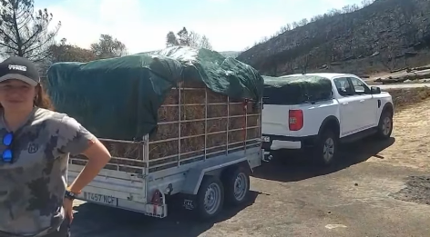 Laura by her loaded-up Ranger PHEV as another delivery takes place. License valid for earned editorial, press releases, press kits. All non-broadcast digital and online media Region: Global. This content is solely for editorial use and for providing individual users with information. Any storage in databases, or any distribution to third parties within the scope of commercial use, or for commercial use is permitted with written consent from Ford in Europe GmbH only. 